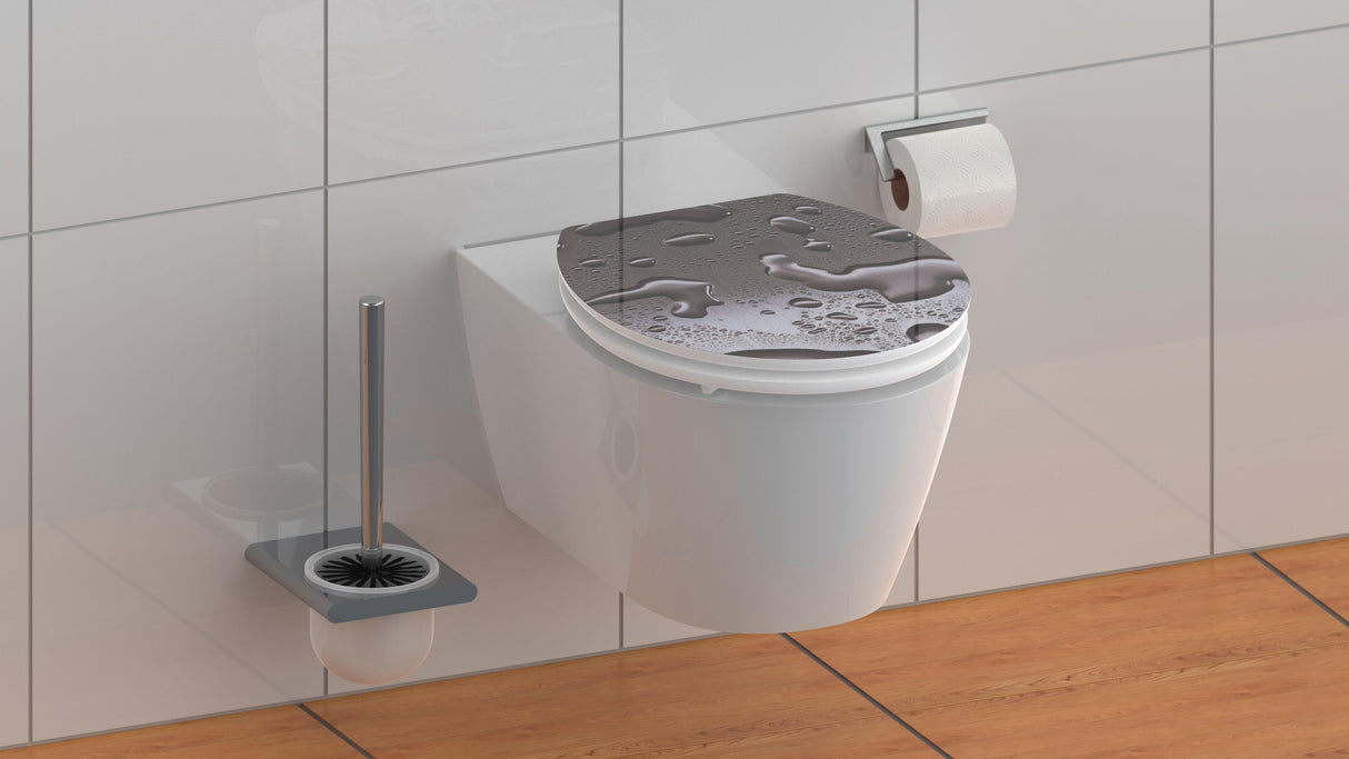 Högblank mönstrad toalettsits universal med trĂ€kĂ€rna - BĂTTRE. CC-mĂ„tt: 130-185mm LĂ€ngd: 425-475mm Bredd: 370mm.